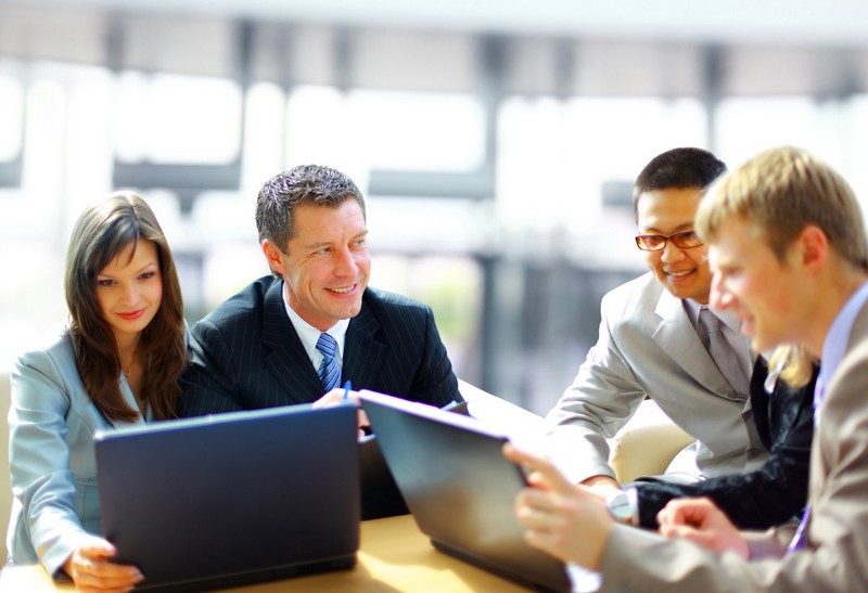 Business meeting -  manager discussing work with his colleagues