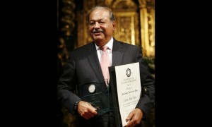 Mexican billionaire Carlos Slim Helu smiles after receiving the "Sor Juana Ines de la Cruz" Medal in Mexico City