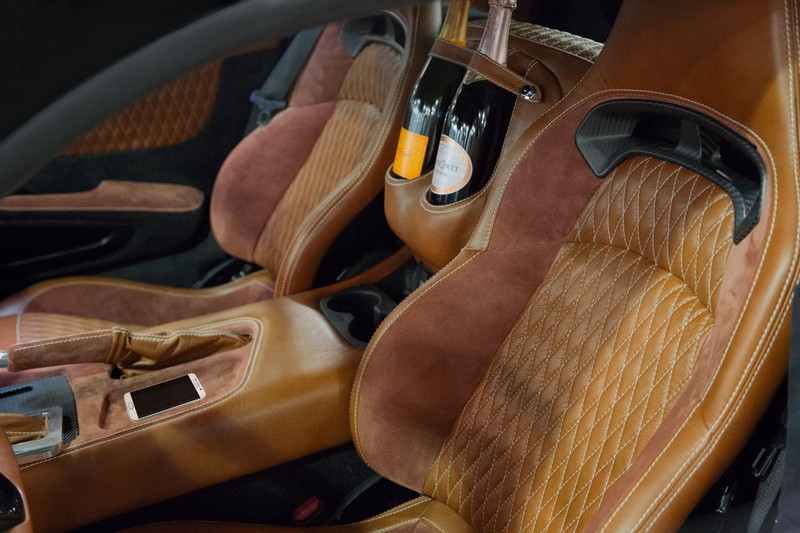 745-HP Force 1 V10 interior with champagne bottles