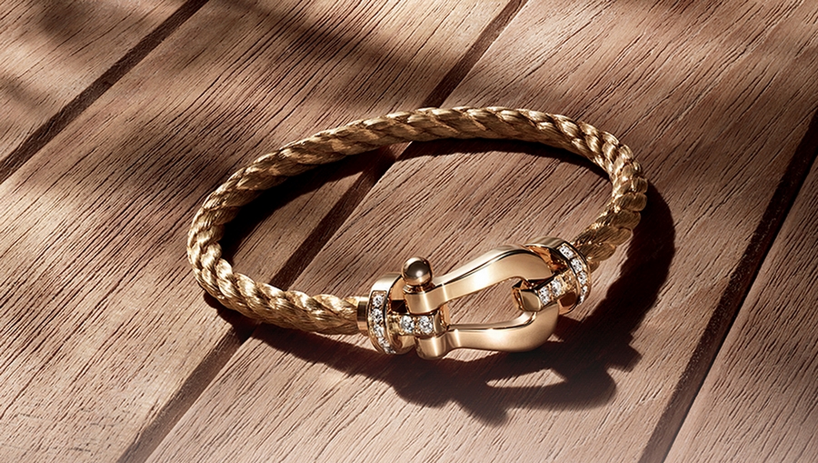 Exceptional Jewelry: Fred, Force 10 bracelet in yellow gold and paved white  diamonds 