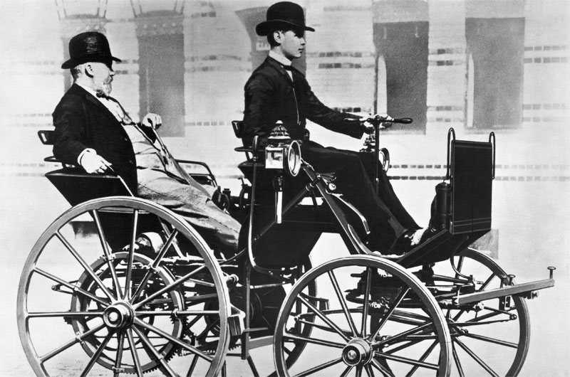 Gottlieb Daimler and his son Adolf on the motor carriage, 1886