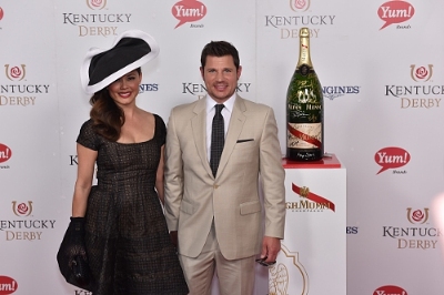 Nick and Vanessa Lachey celebrate with the official champagne of the Kentucky Derby, G.H.MUMM