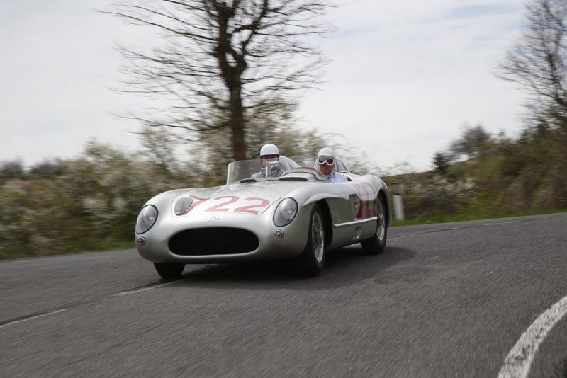 Sir Stirling Moss at the wheel of the 300 SLR with starting number 722 at the Classic Insight 1955 success stories, 23 April 2015 in Italy.