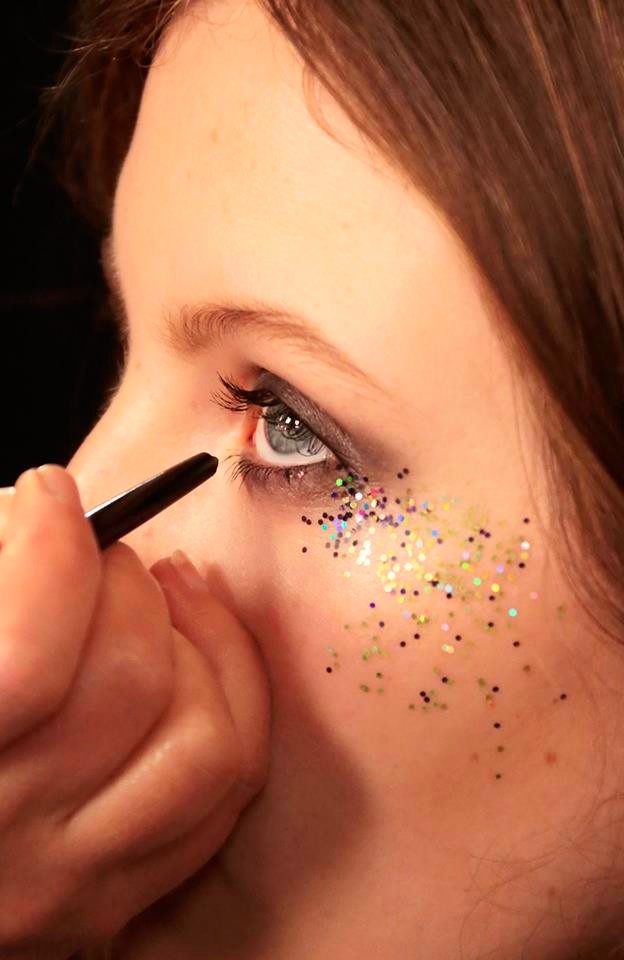 Smoky, glitter-defined eyes created backstage at the Burberry show