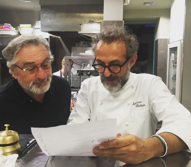 massimo bottura and robert de niro in the kitchen cooking