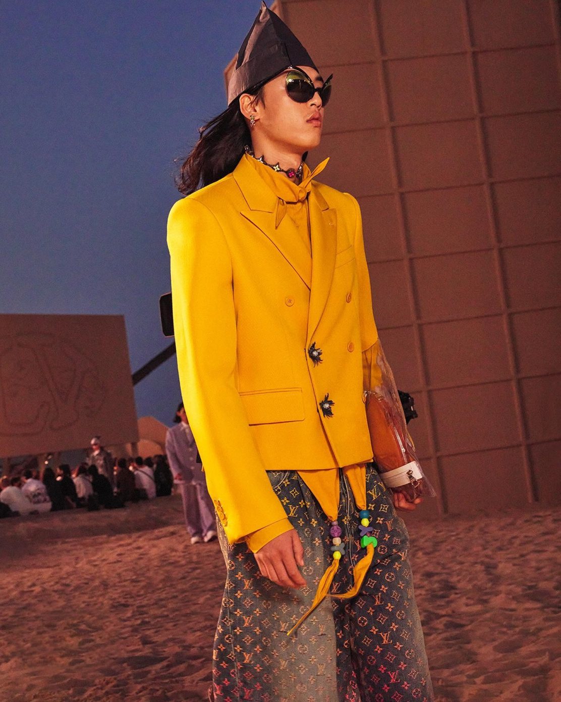 Between ocean and Gobi Desert: Louis Vuitton Spring-Summer 2023 Men in  Aranya, China 