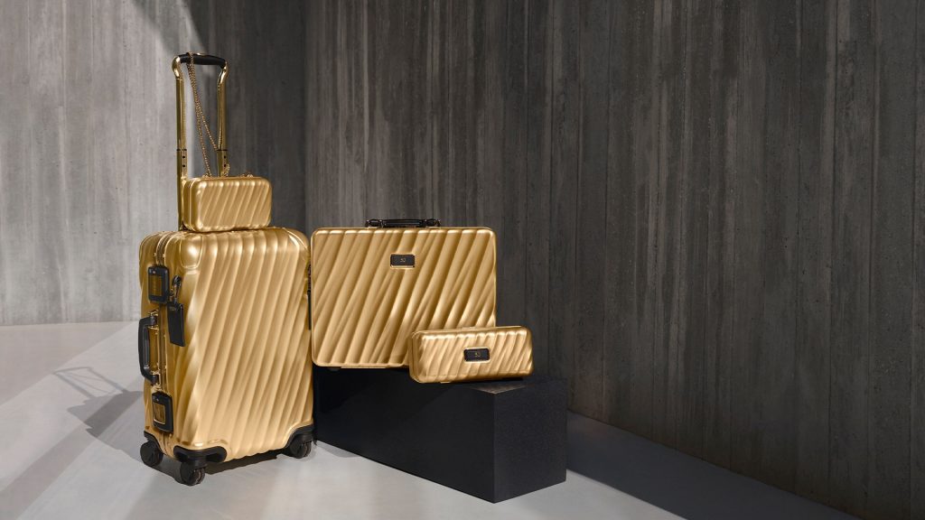 TUMI at 50: When Golden Luggage Becomes the New Gold Standard (Literally)