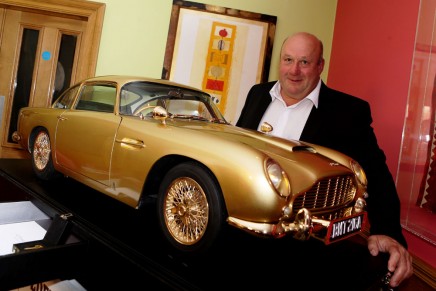 Gold replica of James Bond’s iconic Aston Martin DB5 sold for £55,000