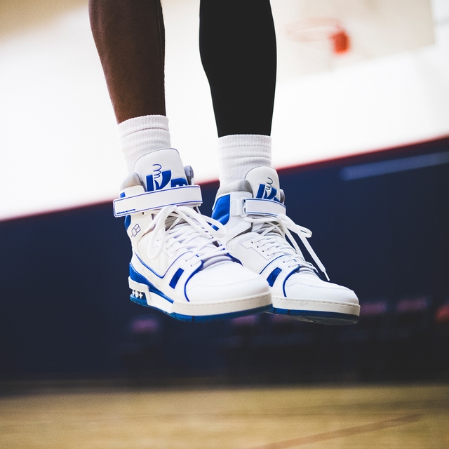 lv trainer sneaker on feet