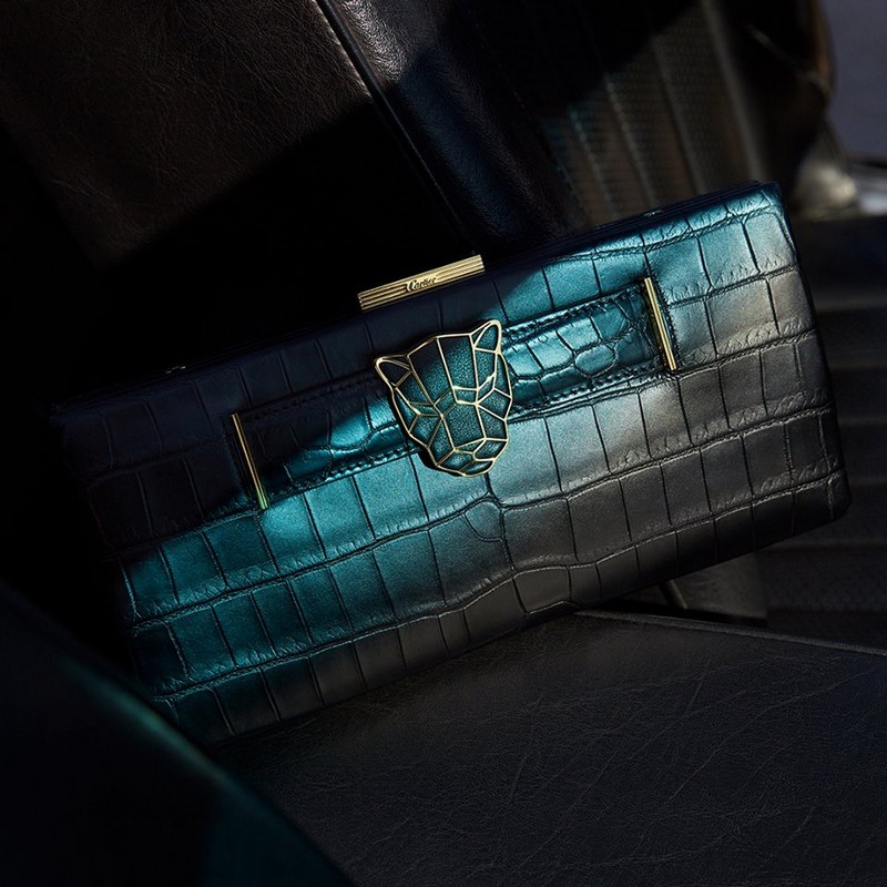 This new Cartier Panther motif on clutches can also be worn as a brooch
