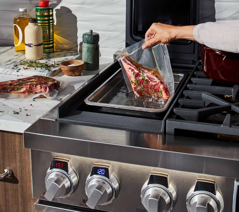 Signature Kitchen Suite 48-inch Dual-Fuel Pro Range with Built-in Sous Vide