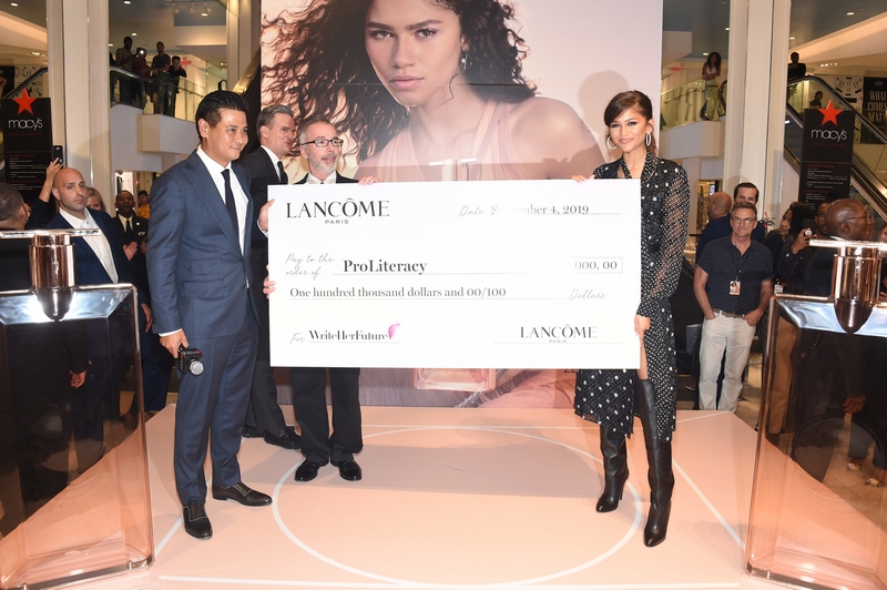 Suriya Parksuwan, President of Lancôme USA presented check to Kevin Morgan, President & CEO of ProLiteracy