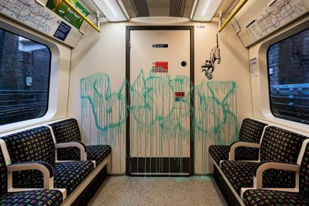 Banksy creates mask-themed work on London Underground