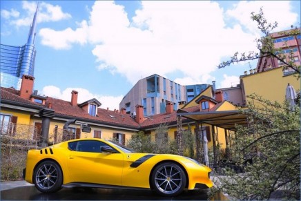 A yellow Ferrari on the hot roof. The prancing horse celebrated during Milan’s Design Week