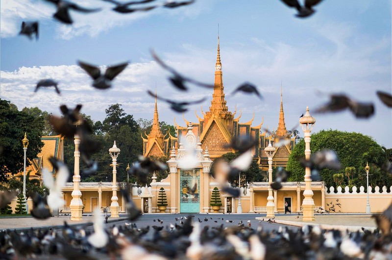 the golden Royal Palace — located within walking distance of Rosewood Phnom